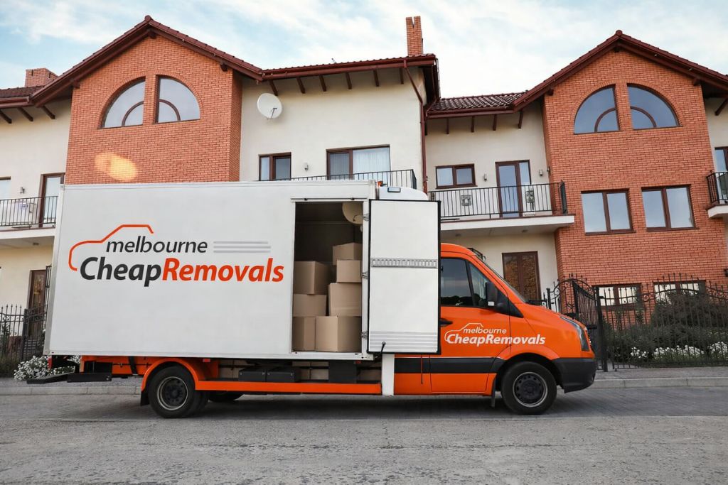Professional movers Melbourne truck parked outside residential home during house relocation