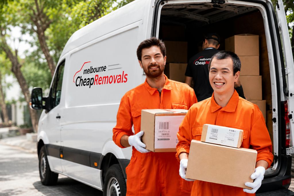 Removalists Melbourne team loading boxes into a moving van for a delayed home relocation